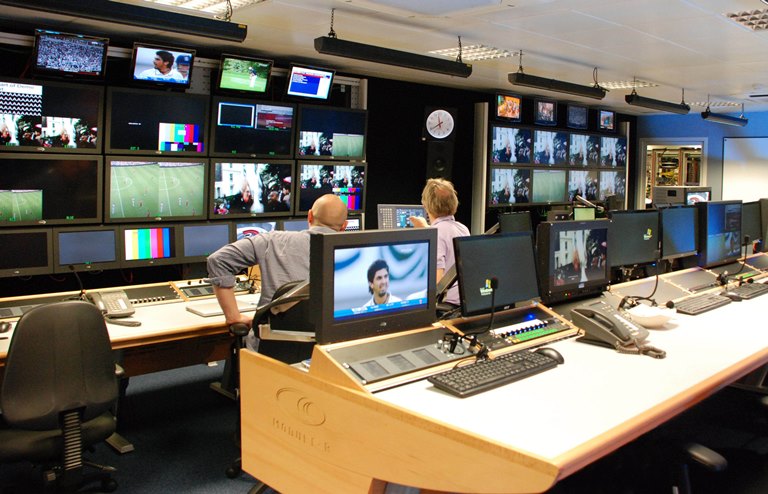 Examples-of-Custom-Consoles-Module-R-desks-with-matching-Media-Wall-monitor-scapes-in-a-broadcast-control-environment