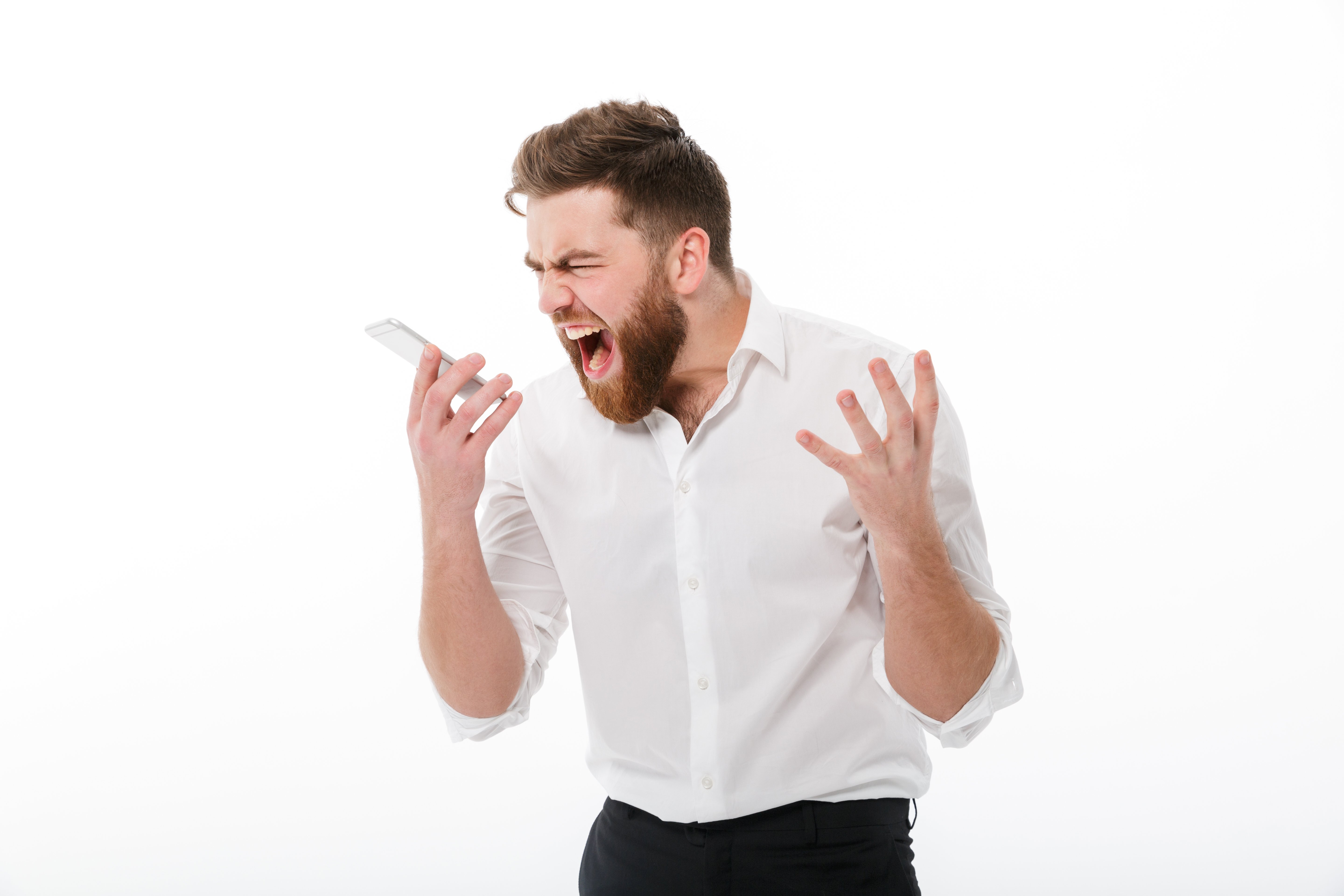 angry-bearded-man-business-clothes-screaming-smartphone