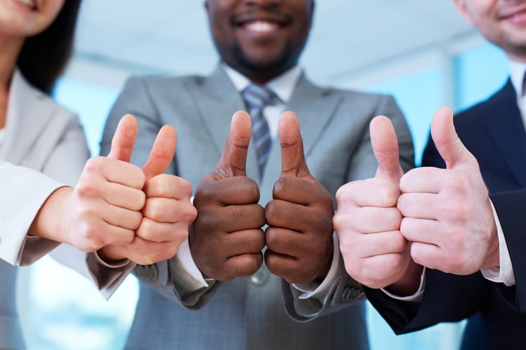 group-happy-workmates-showing-thumbs-up